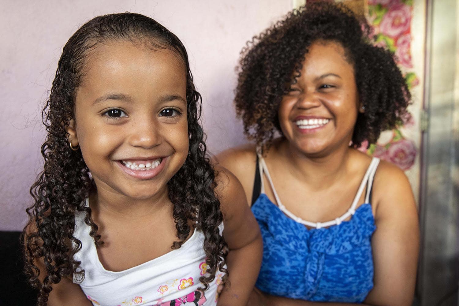 Habitat family smiling together