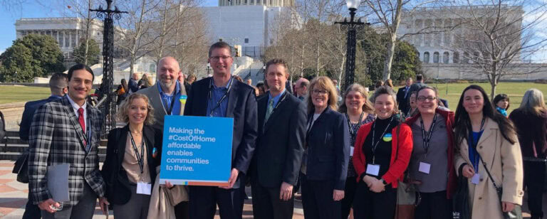 Habitat employees at Washington DC in front of capitol