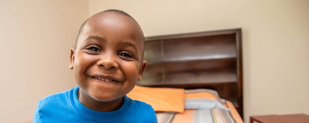 Image of Habitat family child in new bedroom