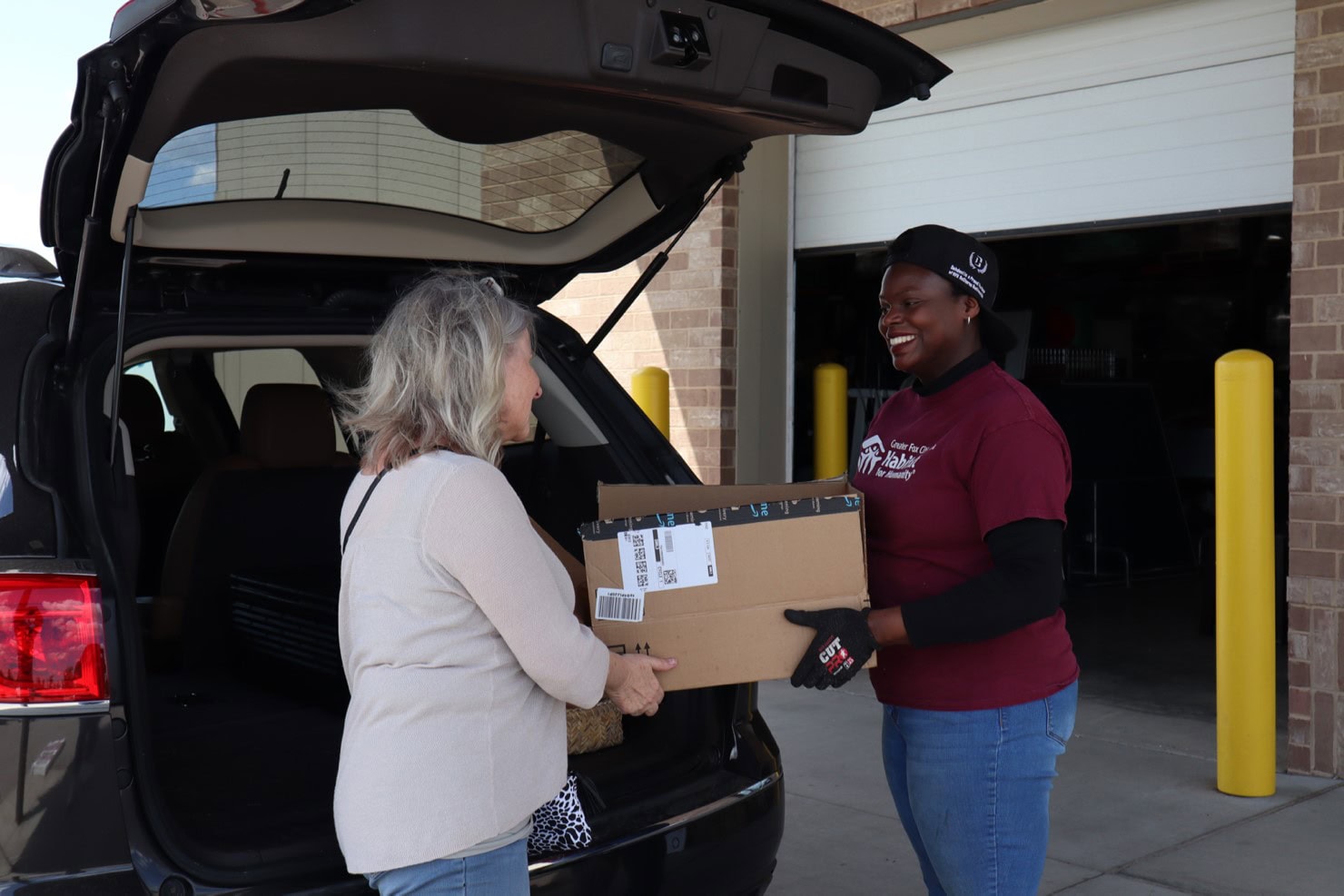 ReStore employee taking donations