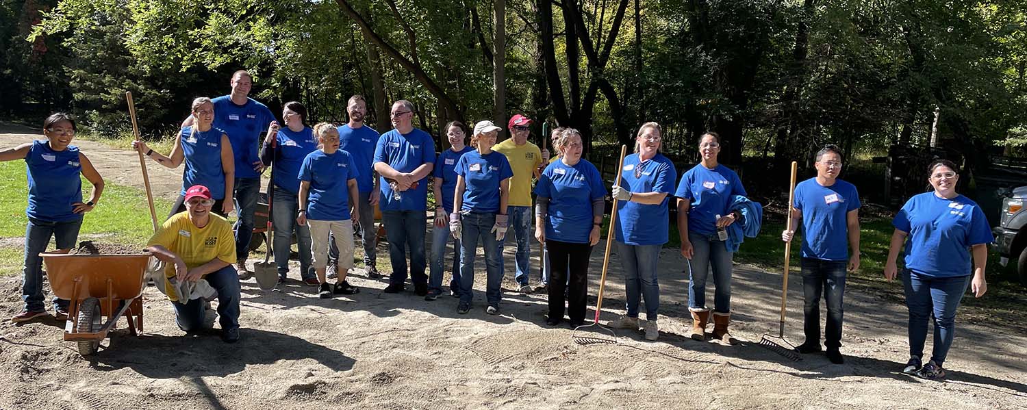 Group of volunteers working at park