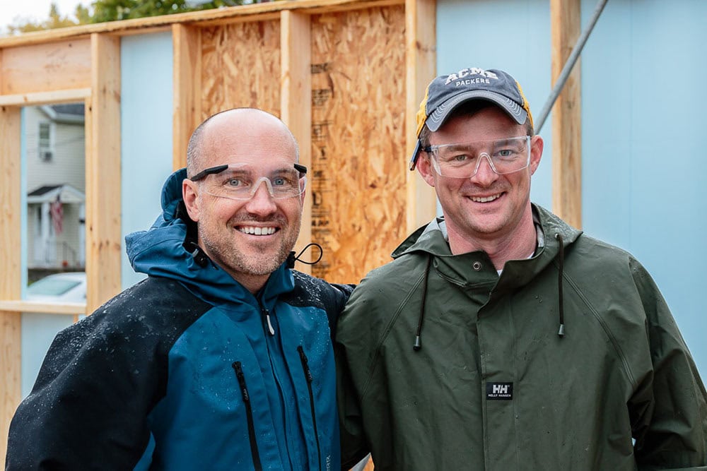 Volunteers working on construction site together