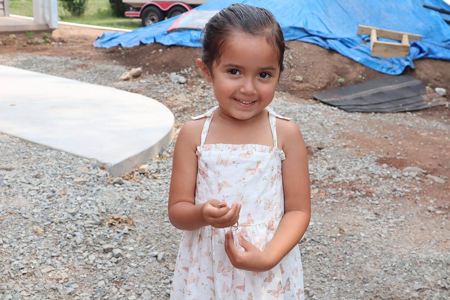 Girl holding keys to Habitat home